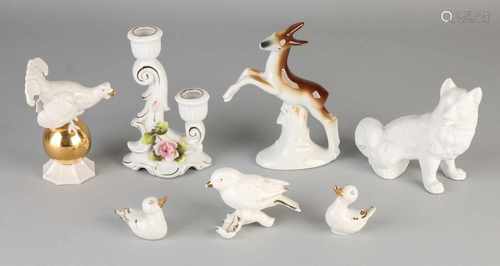 Seven times varied (German) porcelain. Circa 1930 - 1960. Candlestick, rose corrupted. Auerhaan