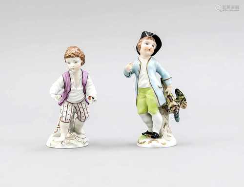 Two antique German Dresden porcelain figures. Boy with two birdies. Boy with pheasant. Circa 1900.