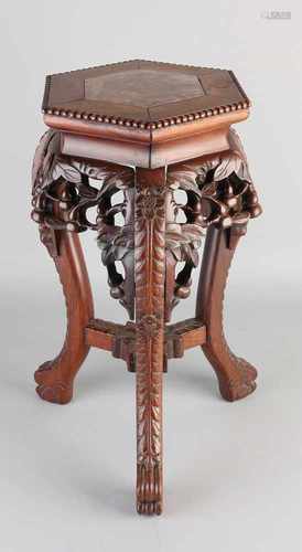 Small Chinese wooden stool with inserted hexagonal sheet of marble, tendrils and claw feet. 20th