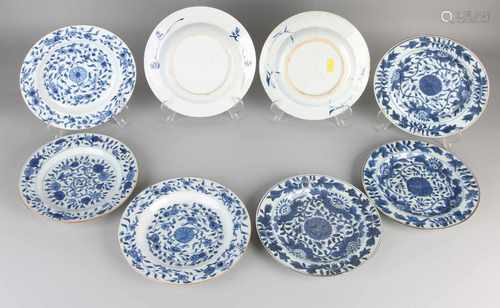 Eight 18th - 19th century Chinese porcelain plates with floral decor. Two sets of four. One set of