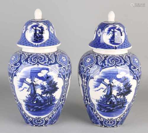 2-Piece ceramic Delft garniture with landscapes decor wings. 20th century. Dimensions: H 37 x Ø 18