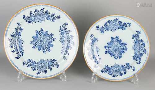 Two major 18th century Delft Fayence signs with floral decor and ocher edge. Slight damage. Size: