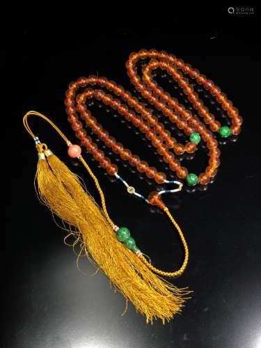 A Chinese Natural Amber Beads String