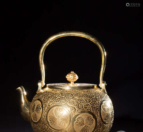 A Chinese Relief Gilded Bronze Girder Tea Pot