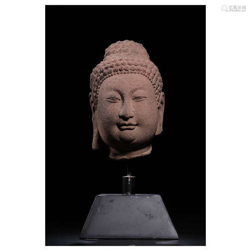 A Chinese Red Sandstone Sakyamuni Head Statue