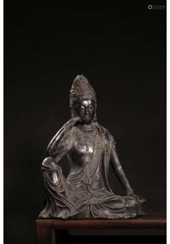 A Chinese Bronze Guanying Seated Statue