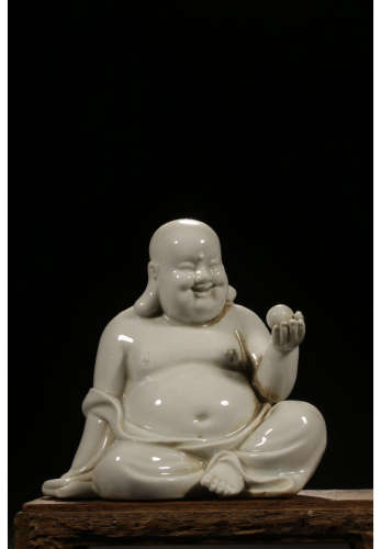 A Chinese Porcelain Maitreya