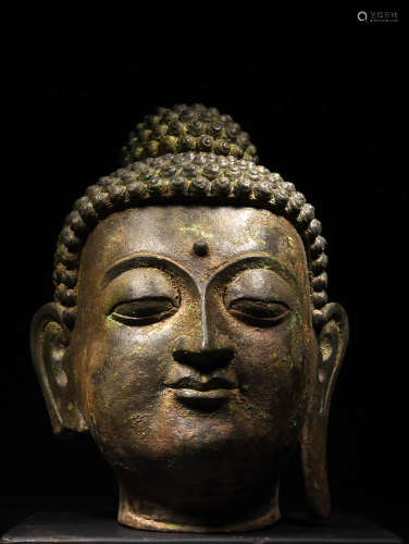 A Chinese Gilded Bronze Buddha Head Statue