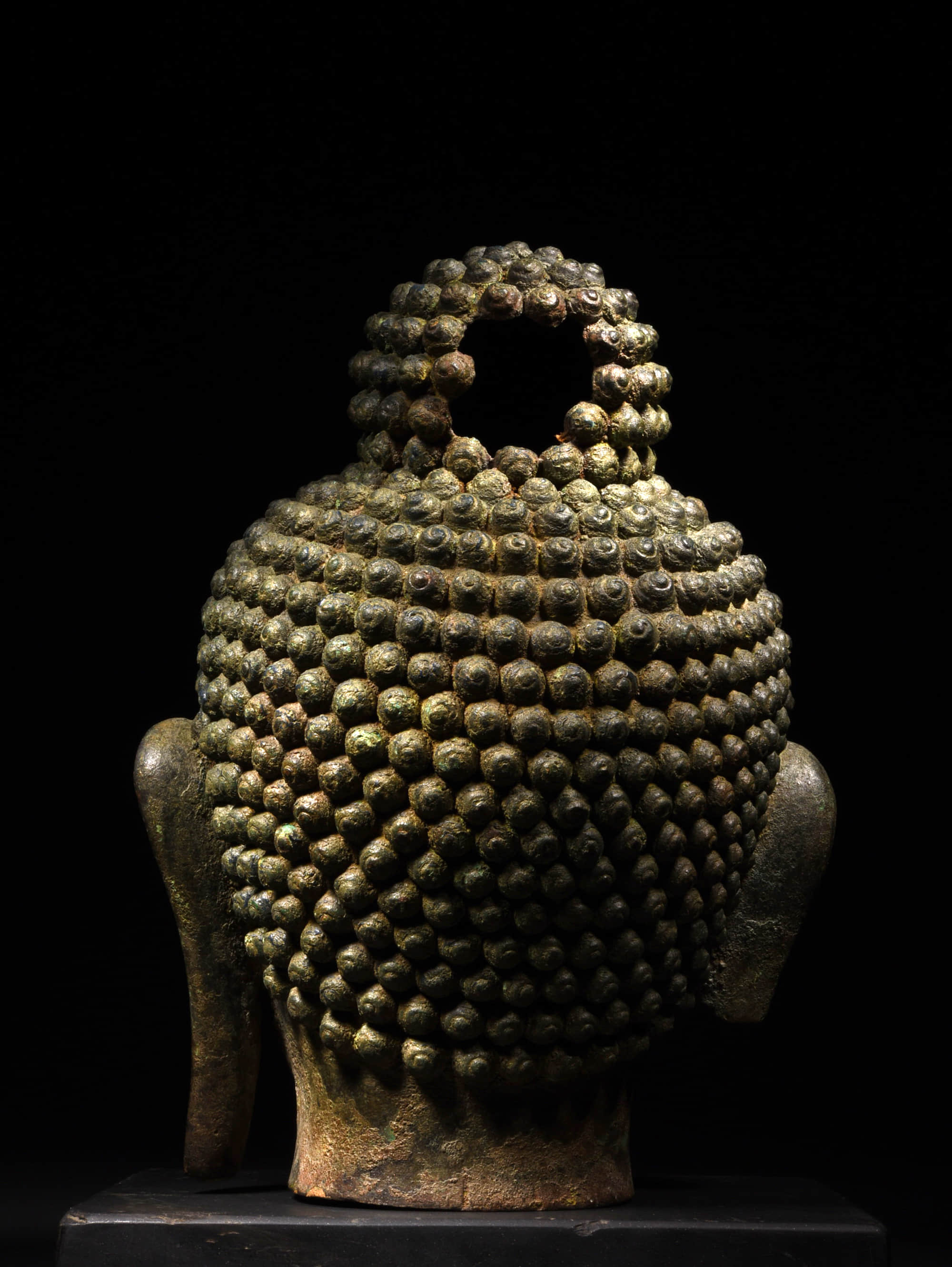 a chinese gilded bronze buddha head statue