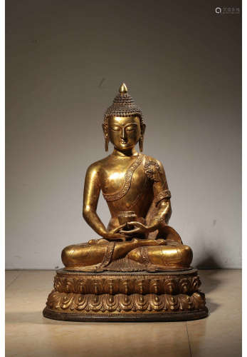 A Chinese Gilded Bronze Gold Pharmacist Buddha Seated Statue