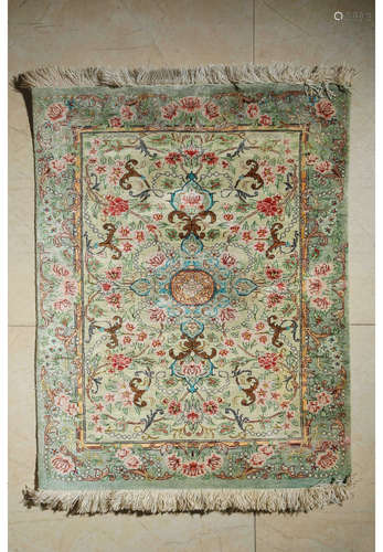 A Chinese Persian Floral Silk Carpet