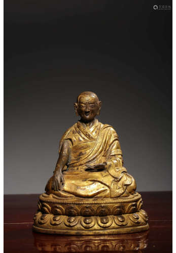 A Chinese Gilded Bronze Panchen Seated Statue