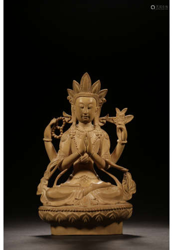 A Chinese Carved Boxwood Guanyin Seated Statue