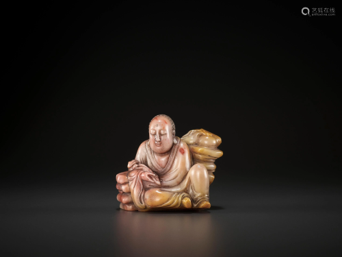 A SOAPSTONE FIGURE OF A LUOHAN, QING