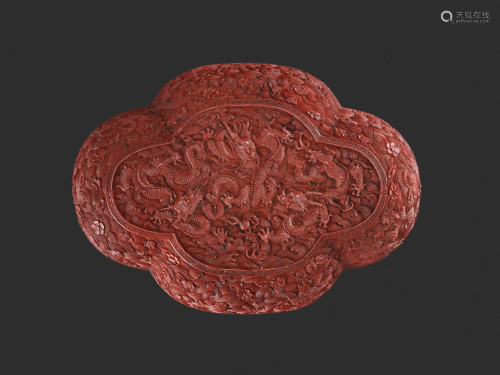 A CINNABAR LACQUER BOX, QIANLONG MARK AND…