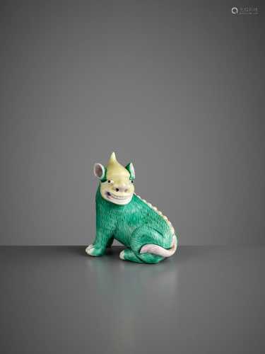 A SMALL BISCUIT FIGURE OF A QILIN, KANGXI