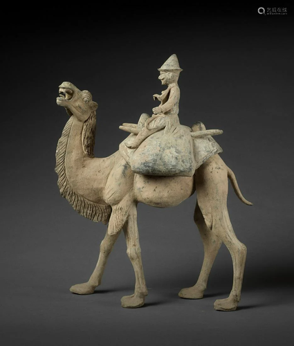 A VERY LARGE CAMEL AND RIDER POTTERY GROUP, …