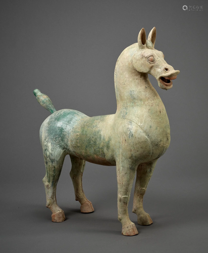 A VERY LARGE GLAZED POTTERY HORSE, HAN DYNA…