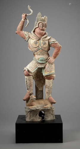 A MONUMENTAL POTTERY FIGURE OF LOKAPAL…