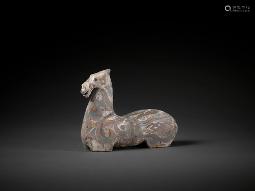 A FINELY PAINTED HAN DYNASTY MODEL OF A HORSE