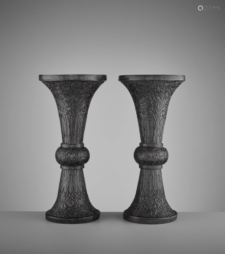 A PAIR OF BRONZE REPOUSSE GU VASES, MID-QI…