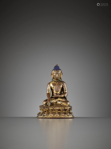 A GILT COPPER ALLOY BUDDHA, KHASA MALLA 13T…