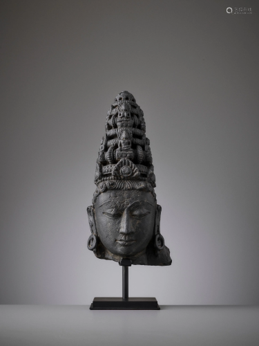 A SCHIST HEAD OF A FEMALE DEITY, PALA EMPIRE