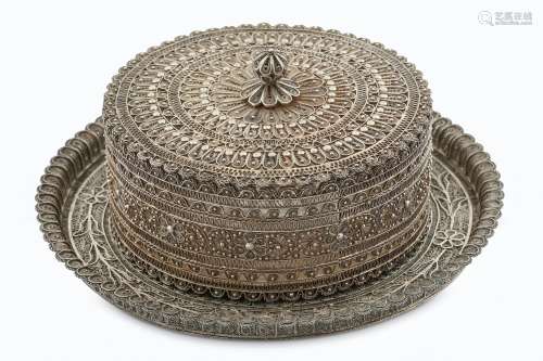 A SILVER FILIGREE LIDDED BOX WITH SAUCER