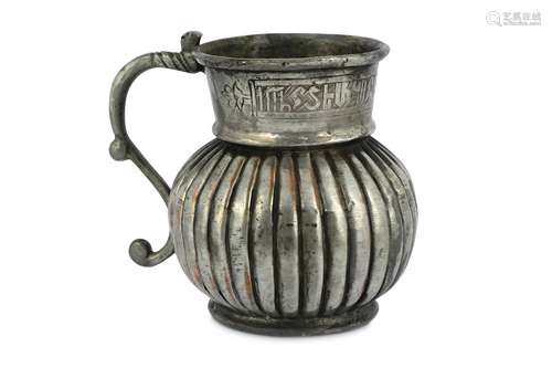 A TINNED COPPER JUG