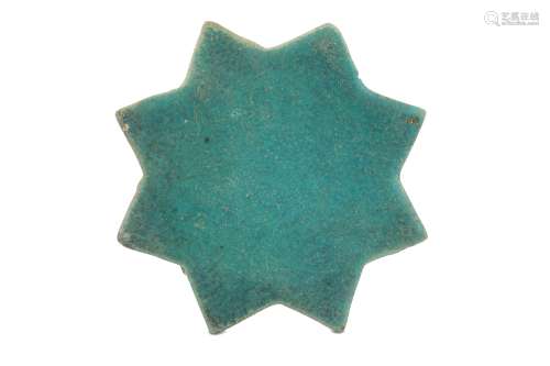 A TURQUOISE-PAINTED STAR POTTERY TILE PROPERTY OF THE LATE BRUNO CARUSO (1927 - 2018) COLLECTION