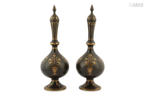 *A PAIR OF QAJAR GOLD-DAMASCENED STEEL BOTTLES