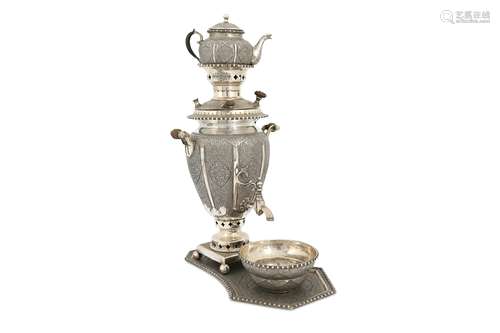 A MINIATURE IRANIAN SILVER SAMOVAR