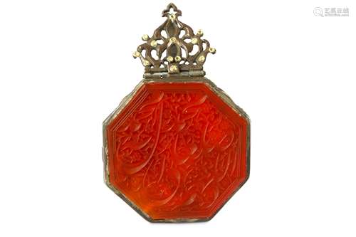 AN OCTAGONAL CARNELIAN PENDANT