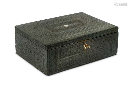 A CARVED WOODEN BOX