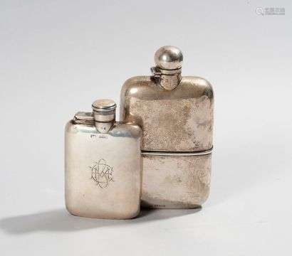 Two plain silver alcohol flasks, one with integrated cup, the other monogrammed.London 1908 and Birmingham 1929Small shocksWeight: 248 g