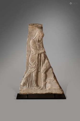 ROMAN ART, 1st, 2nd centuryPiece of marble bas-relief. The stele is carved of a woman with veiled hair, one foot wearing a winged sandal at her side, probably Mercury.Height: 61 cm, length: 40 cm