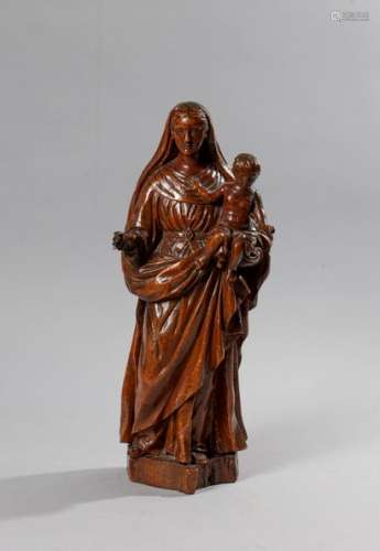 Carved wooden group depicting a virgin and child. Popular art XIXth centuryHigh. : 42 cm(accidents and restorations)