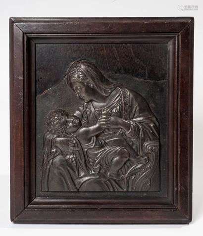 The Virgin of Tenderness Cast iron plate in low relief, French school of the end of the 18th century Missing the upper part, mounted on a wooden base. 17cm x 16 cm