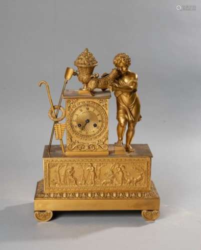 A gilded and chased bronze boundary clock decorated with a young shepherd holding a sheep. Empire periodHigh. :43 cm - Width : 31 cmDepth: 13 cm. (Accident, needle missing)