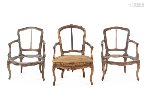 A Pair of Louis XV Fauteuils and an Associated F…