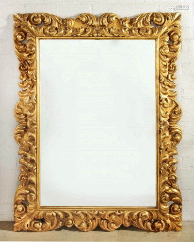 An Italian Baroque style giltwood mirror