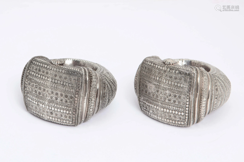 Two African silvered metal currency bangles