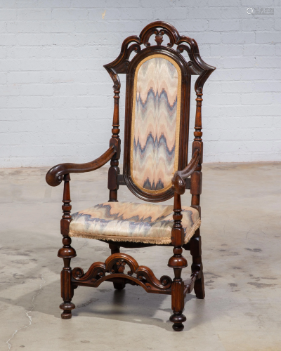 A Continental Baroque carved walnut armchair