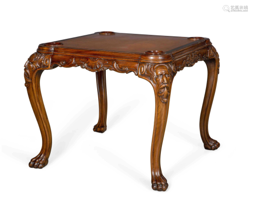 A George II style mahogany games table