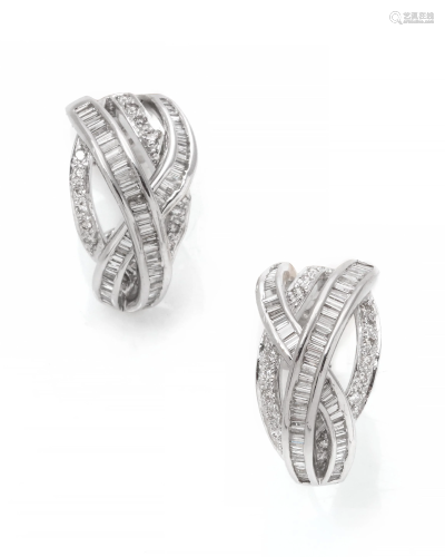 A pair of diamond and 18k white gold earclips