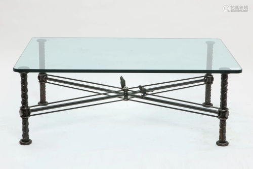 An Ilana Goor iron and plate glass coffee table