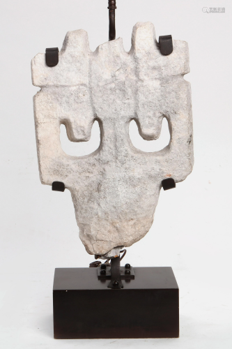 A Mesoamerican carved stone fragment now a lamp