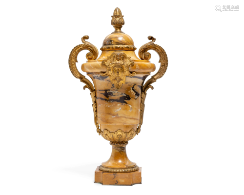 A Louis XV style siena marble covered urn