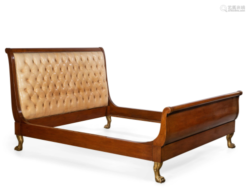 A parcel gilt mahogany California King bed frame
