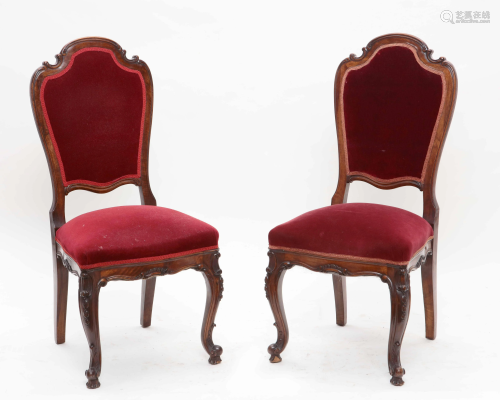 A pair of Rococo style walnut side chairs